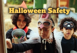 Halloween Safety with three children trick or treating.